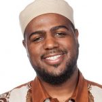 Picture of African-American man with friendly smile in Islamic dress