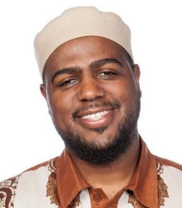 Picture of African-American man with friendly smile in Islamic dress